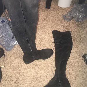 Knee high black heeled boots
